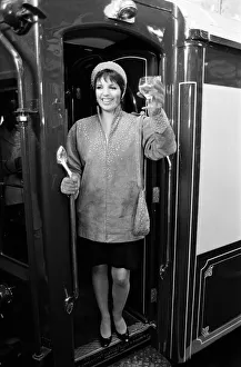 01365 Prints: Passengers, dressed for the occasion, boarding the Orient Express