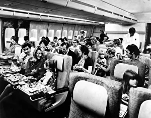 Steward Prints: Passengers relax in the spacious interior of a Boeing 747 Jumbo Jet