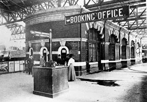 Passengers waiting for the booking office on Platform One at Snow Hill Station in