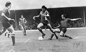 past a challenge during the game v Colchester United - 15th November 1975