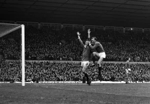 00222 Prints: Pat Crerand celebrates with Brian Kidd after third goal 1970 for Manchester United