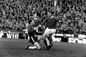 Pat Crerand of Manchester United is tackled January 1971 by Chelseas Peter Houseman