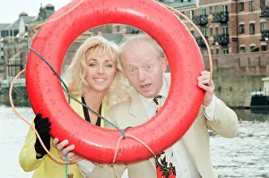 00920 Prints: Paul Daniels, magician, pictured with wife Debbie McGee, at the riverside, in York