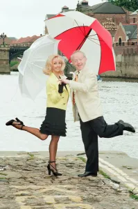 00920 Prints: Paul Daniels, magician, pictured with wife Debbie McGee, at the riverside, in York