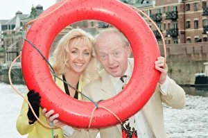 00920 Prints: Paul Daniels, magician, pictured with wife Debbie McGee, at the riverside, in York