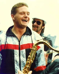 00222 Prints: Paul Gascoigne (Gazza) promoting his version of Fog on The Tyne watched by Alan Hull of