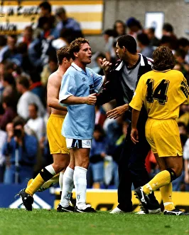 Confrontation Prints: Paul Gascoigne of Italian club side Lazio shouting abuse at a fan on the pitch following
