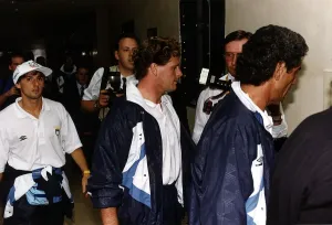 00302 Prints: Paul Gascoigne surrounded by phpotographers and reporters after he walked silently out of