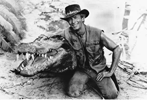 Reptiles Prints: Paul Hogan Actor as crocodile Dundee the tough guy from the Outback December