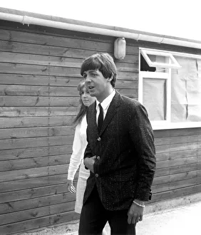 Paul McCartney and actress Jane Asher arriving at Luton Airport, May 1964