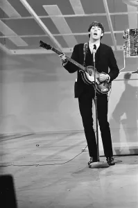 00267 Prints: Paul McCartney, bass guitarist and singer with British pop group The Beatles rehearsing