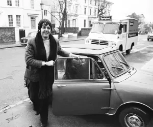 Paul McCartney of the Beatles with his mini car 27th December 1967