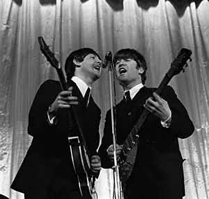 Guitars Prints: Paul McCartney & John Lennon of The Beatles perform on stage November 1964