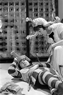 Paul McCartney and John Lennon from The Beatles rehearsing for the filming of