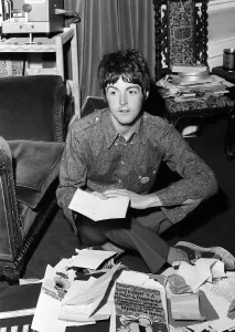 Paul McCartney opens up birthday cards from his fans on his 25th birthday. 18 June 1967