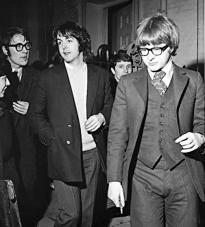 Paul McCartney with Peter Asher leaving Apples offices February 1969