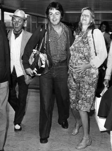 Time Prints: Paul McCartney, former singer with The Beatles and wife Linda at London Airport June