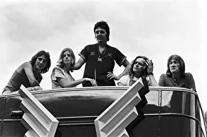 Paul McCartney and his wife Linda in Paris, France, with other members of the group Wings