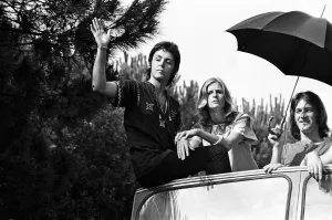 Paul McCartney and his wife Linda in Paris, France, with other members of the group Wings