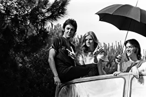 01476 Prints: Paul McCartney and his wife Linda in Paris, France, with other members of the group Wings