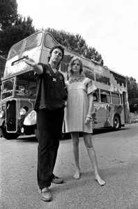 01476 Prints: Paul McCartney and his wife Linda in Paris, France, with other members of the group Wings