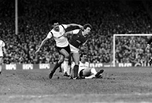 Paul McGrath of Manchester United challenges Tony Woodcock of Arsenal during the clash