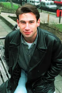 Paul Opacico Actor in the TV Programme Emmerdale wearing black leather jacket