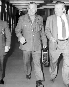 Firefighter Prints: Paul Red Adair Texas firefighter arrives at Heathrow Airport en route to Norway