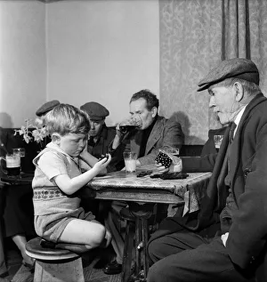 Grandfather Prints: Paul Reynolds, 4 yrs. old, plays John William Moulson 80 yrs. old, at dominoes