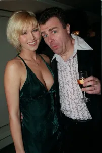 Paul Ross TV Presenter April 98 At Planet Hollwood with his arm round model Emma