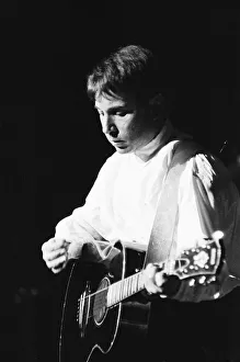 00599 Prints: Paul Simon seen here performing on stage at the Royal Albert Hall during his