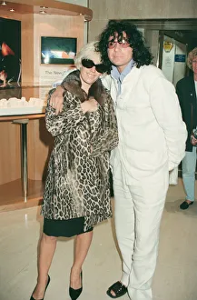 Paula Yates and her boyfriend, INXS singer Michael Hutchence leave Heathrow Airport for