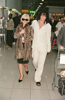 Paula Yates and her boyfriend, INXS singer Michael Hutchence leave Heathrow Airport for