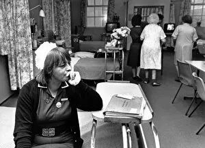Images Dated 1st December 1988: Pause for thought amid empty beds: ward sister Margaret Sheepy takes a final sad look at