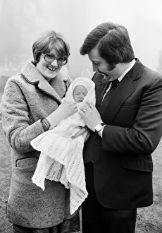 PC Graham Browne and his wife Yvonne pose with their eight week old baby son Clive Brown