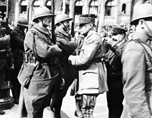 Peace Celebrations in Paris - Marshall Fock decorates a French soldier