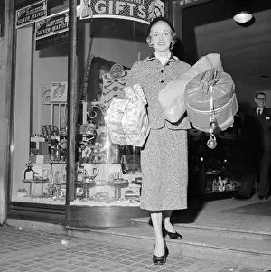 Presents Prints: Peggy Waters who charge clients 7 / 6 per hour to do their christmas shopping