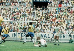 World Cup Prints: Pele evades tackle from Alan Mullery England Brazil World Cup 1970 football