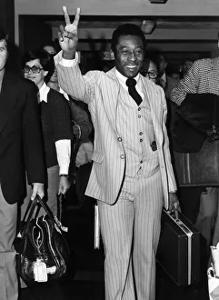 Footballers Prints: Pele football player for Brazil arriving at Heathrow Airport from Lisbon 1977