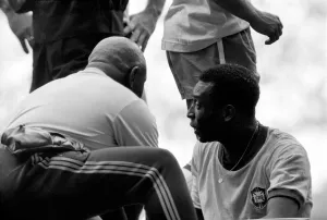 Pele is seen to by a medic. Brazil v. Uruguay: World Cup Semi-Final
