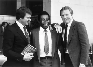 00207 Prints: Pele teams up with old rivals Geoff Hurst left and Bobby Moore in London to promote