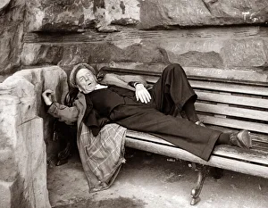 00101 Prints: Pensioner takes a nap on a park bench Sleeping old people Senior gentleman