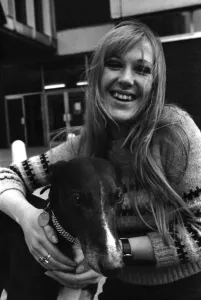 Miniskirt Prints: People with animals. Woman. Fiena Ward with her dog Barnabas outside Manchester College