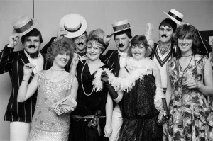 People celebrating New Years Eve at a Roaring Twenties party
