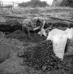 Rural Scene Prints: The people of Craghead in County Durham are taking the chance of a bit of free coal by