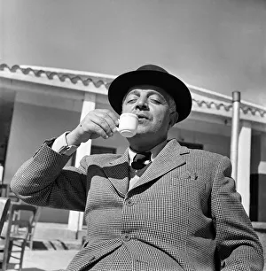 00014 Prints: People of Cyprus. Local man enjoying a cup of coffee in a cafe. March 1952 C1296-002