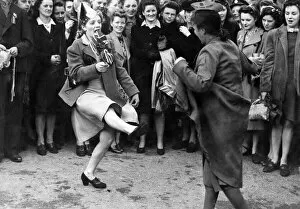 00661 Collection: People dancing in the street on VE Day in Piccadilly Gardens, Manchester. 8th May 1945