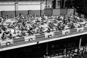 00804 Prints: People enjoying the hot weather at the Oasis outdoor swimming pool Lido, London
