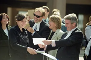 01106 Prints: People in Liverpool city centre watching the solar eclipse. 11th August 1999