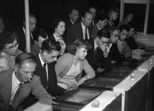 01474 Prints: People playing the Twenty One Game in a Sixpenny Casino stall in Blackpool